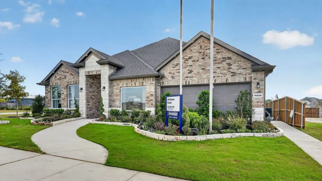 Front exterior of a home in the Wildflower Ranch community, located in Justin, TX (Image 14).