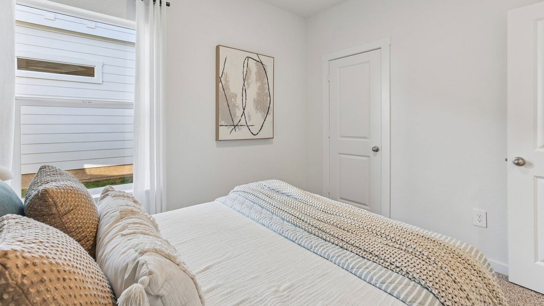 Furnished interior in a model home at Frontier in Mustang Ridge (Image 60).