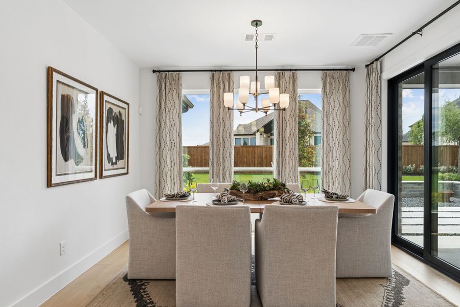 Furnished interior in a model home at Sweetgrass 65s in Haslet (Image 14).