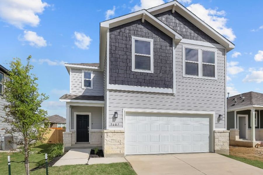 A house with a garage. A house with a garage.