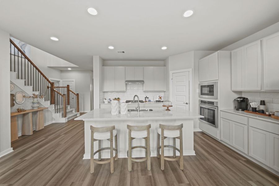 Furnished interior in a model home at Grand Magnolia in Magnolia (Image 7).