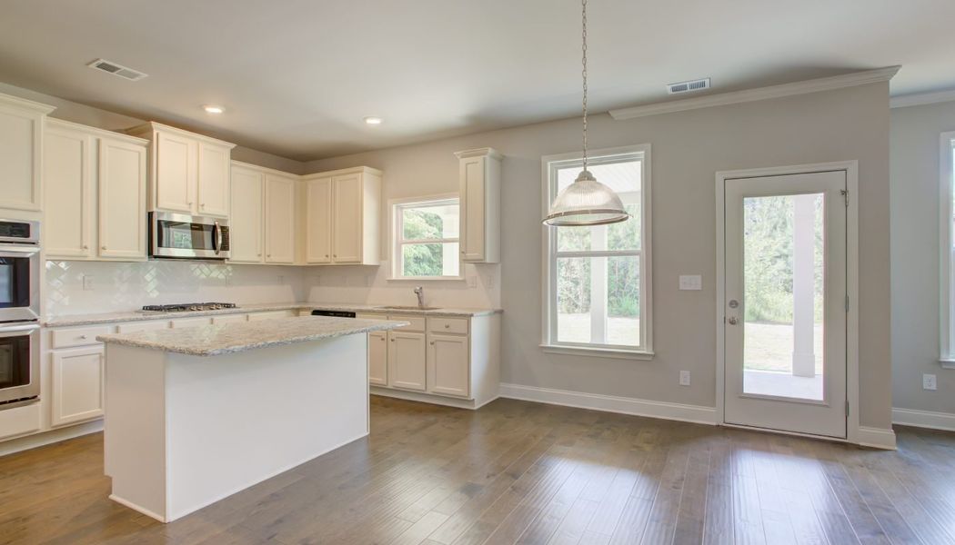 Furnished interior in a model home at Cove Lake Estates in Conley (Image 9).