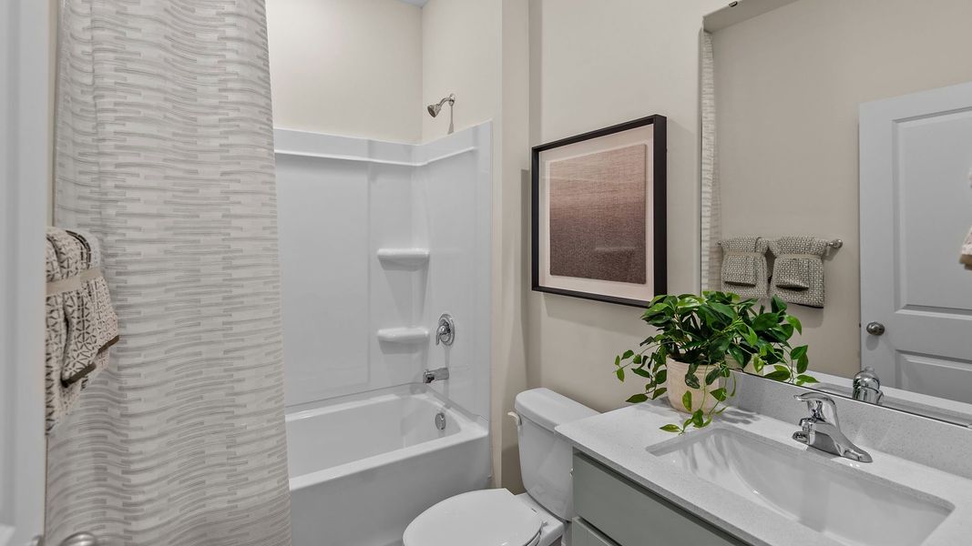 Furnished interior in a model home at The Preserve at Kinsley in Jamestown (Image 14).