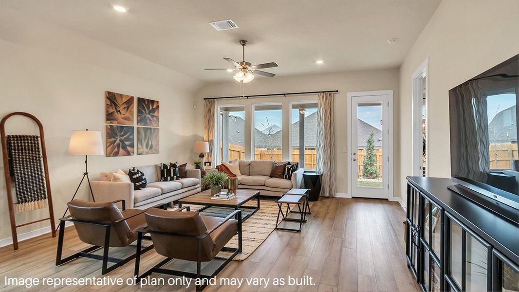 Furnished interior in a model home at Prairie Oaks in Oak Point (Image 14).