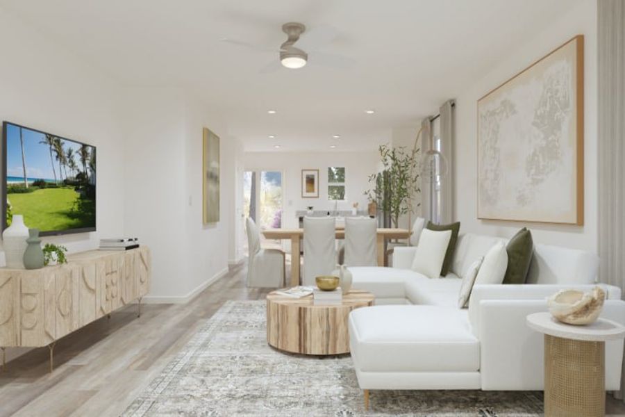 A living room with a large television.