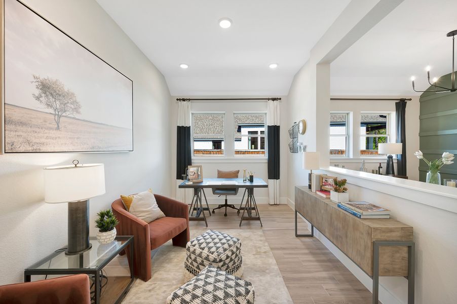 Furnished interior in a model home at The Woodlands Hills - Reserve Collection in Willis (Image 6).