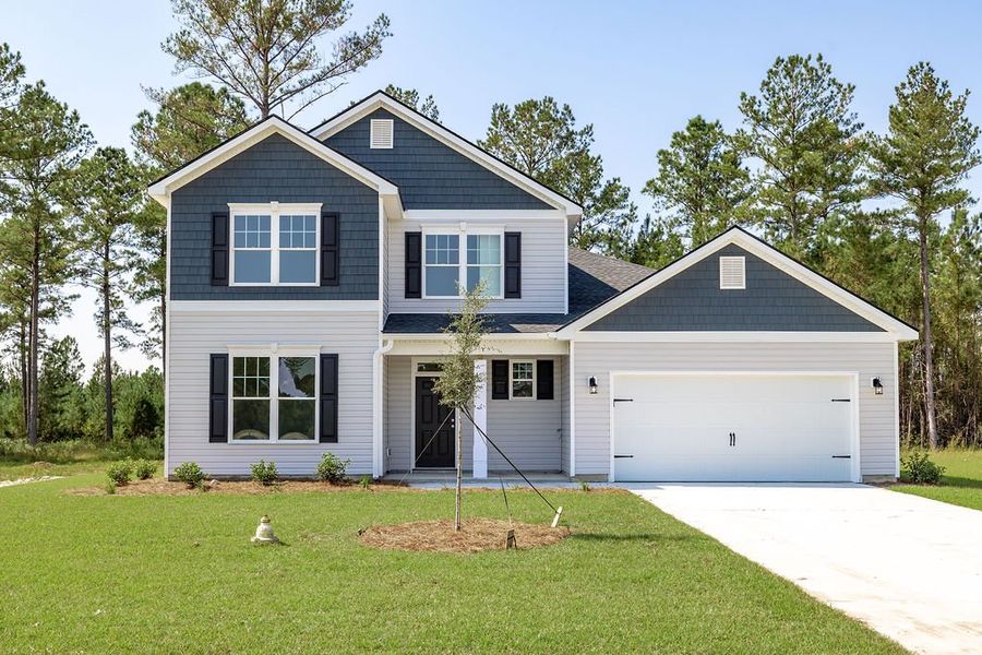 Front exterior of a home in the Covington Pointe community, located in Brunswick, GA (Image 13). Front exterior of a home in the Covington Pointe community, located in Brunswick, GA (Image 13).