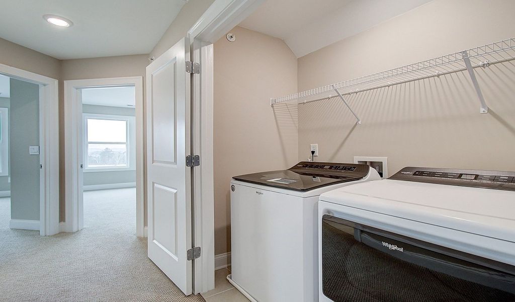 Laundry area on upper-level.