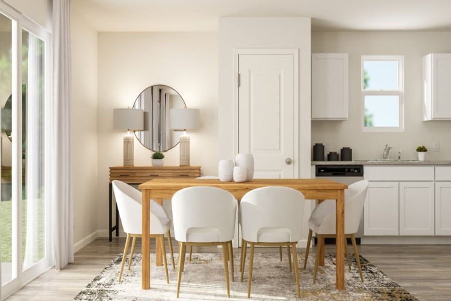 A kitchen with a dining table and chairs. A kitchen with a dining table and chairs.