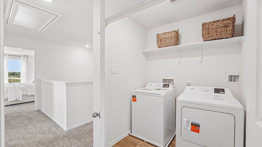 Furnished interior in a model home at Marigold in Kyle (Image 29).