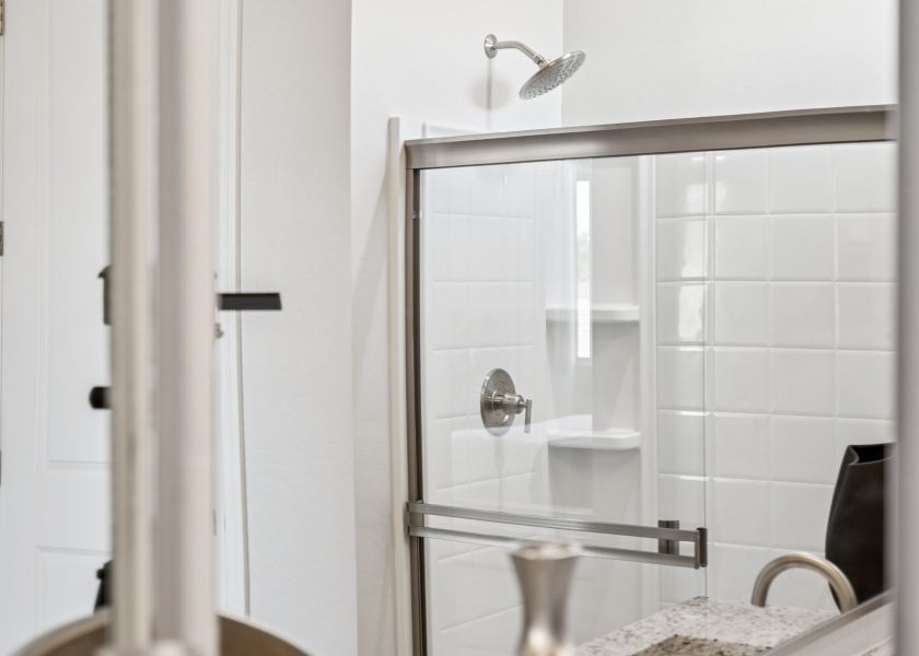 A shower unit in a bathroom.