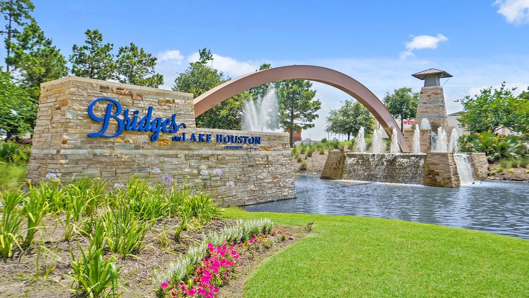 Entrance to the Bridges on Lake Houston Villas community in Humble, TX, featuring signage and landscaping (Image 1). Entrance to the Bridges on Lake Houston Villas community in Humble, TX, featuring signage and landscaping (Image 1).
