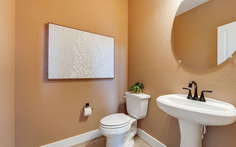 Furnished interior in a model home at Harvest Pointe in Needville (Image 27).