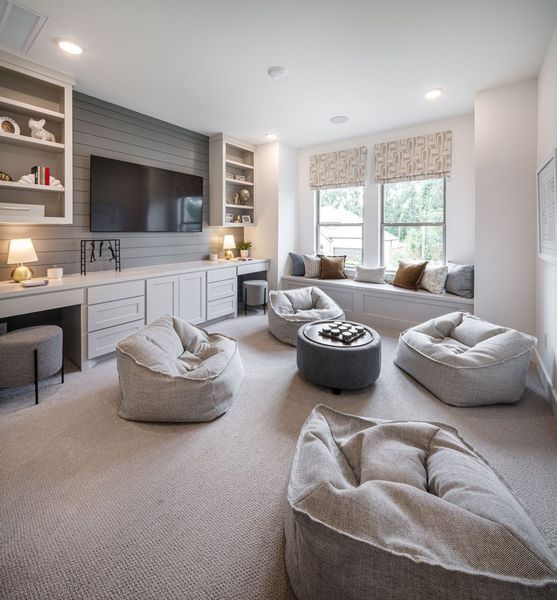 Furnished interior in a model home at The Highlands in Porter (Image 37).