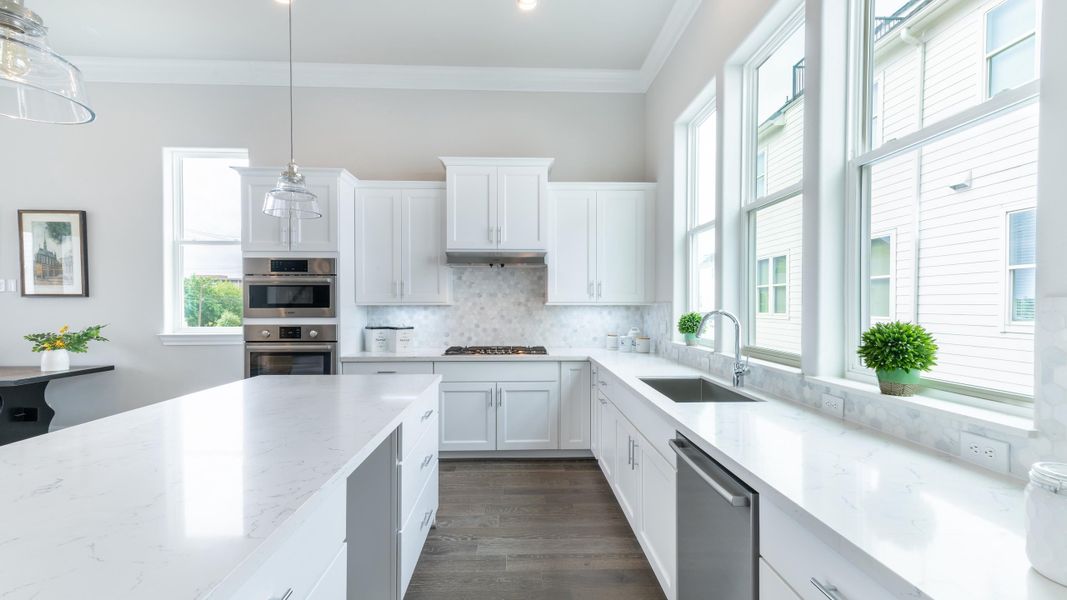 Furnished interior in a model home at Upper East River in Houston (Image 8).