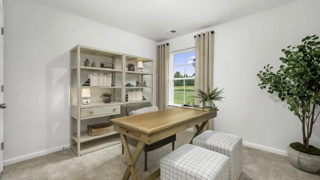 Furnished interior in a model home at Parker Trace in Mocksville (Image 4).