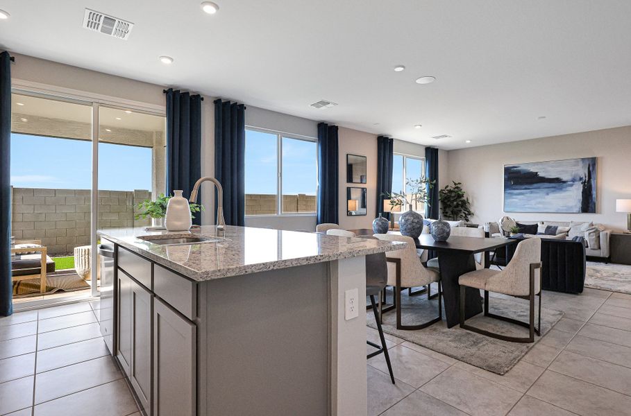 A kitchen with a large island. A kitchen with a large island.