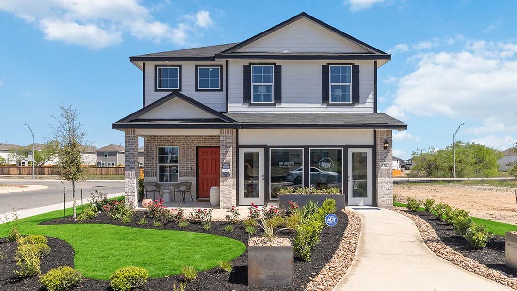 Front exterior of a home in the Blue Ridge Ranch community, located in San Antonio, TX (Image 4).