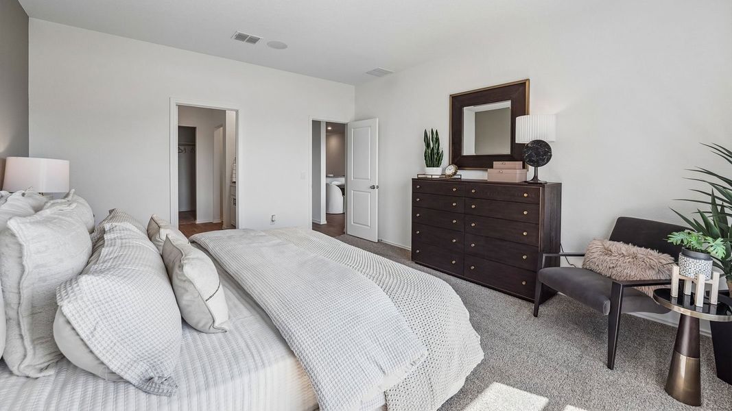 Furnished interior in a model home at Palomino in Manor (Image 36).