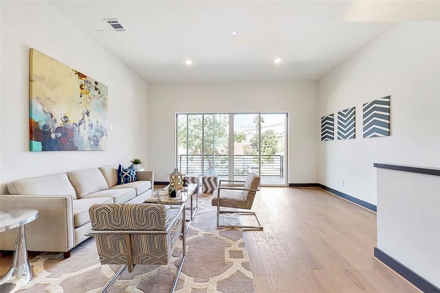 Furnished interior in a model home at Edwards in The Woodlands (Image 13).