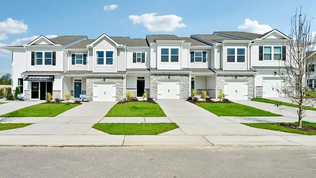 Front exterior of a home in the Chapel Townes community, located in Raleigh, NC (Image 3). Front exterior of a home in the Chapel Townes community, located in Raleigh, NC (Image 3).