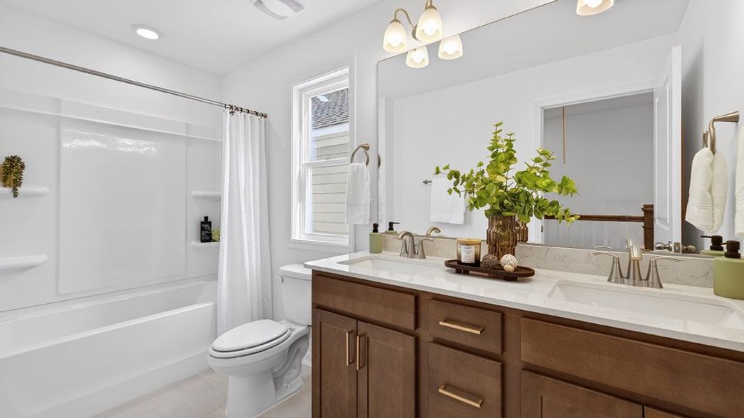 Furnished interior in a model home at Madden West in Fuquay Varina (Image 29).