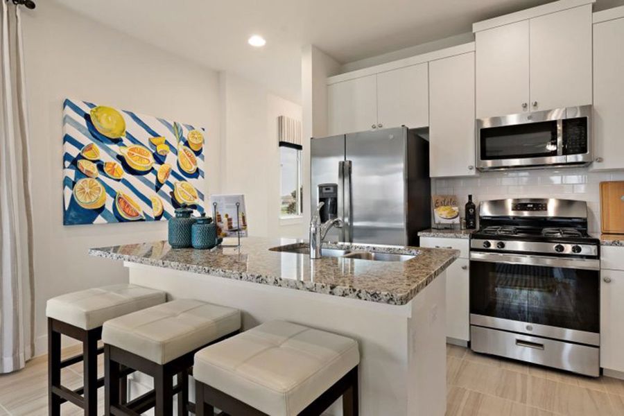 Furnished interior in a model home at Saddle Creek Twinhomes in Georgetown (Image 20).