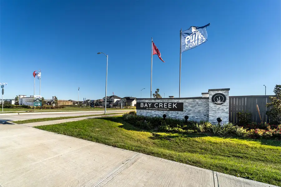 Entrance to the Bay Creek community in Baytown, TX, featuring signage and landscaping (Image 16).