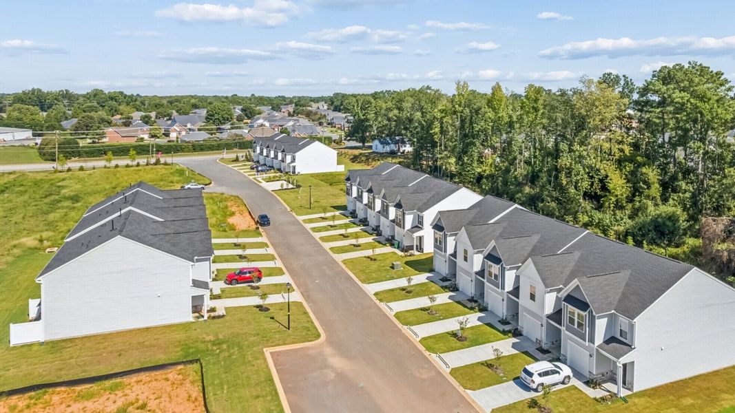 Aerial view of the Trenton Place community in Roebuck, SC, showing layout and nearby surroundings (Image 1). Aerial view of the Trenton Place community in Roebuck, SC, showing layout and nearby surroundings (Image 1).
