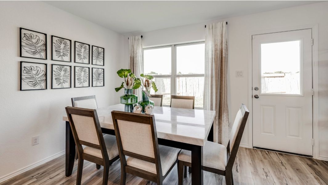 Furnished interior in a model home at Riverwood Ranch: Colonial & Cottage Collections in Angleton (Image 9).