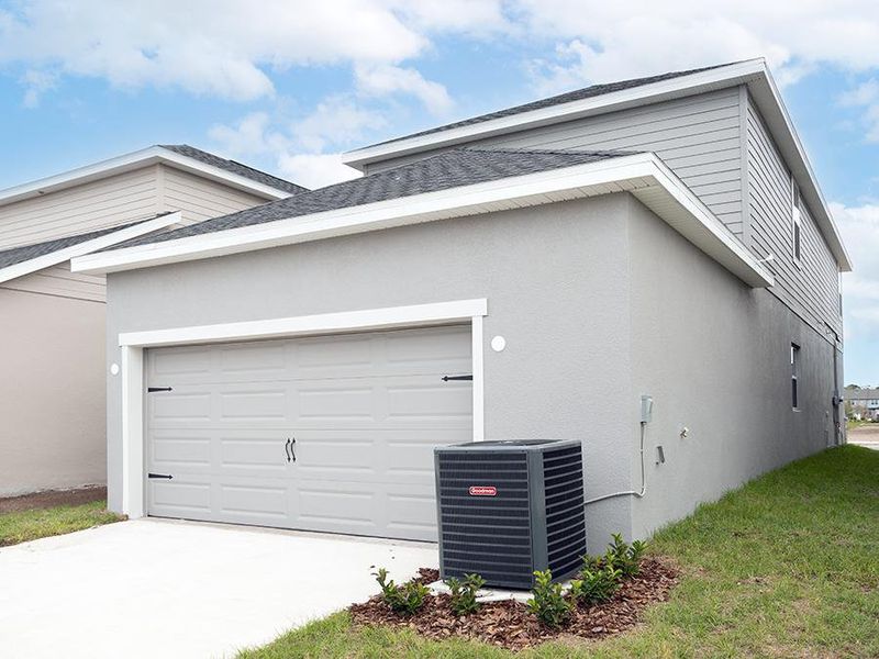 Enjoy the convenience of an attached alley-access garage.