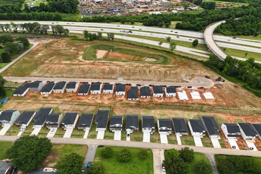 A parking lot with many cars.
