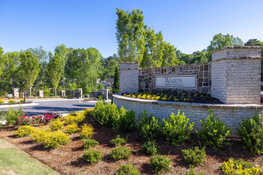 Entrance to the Ward's Crossing community in Johns Creek, GA, featuring signage and landscaping (Image 2). Entrance to the Ward's Crossing community in Johns Creek, GA, featuring signage and landscaping (Image 2).