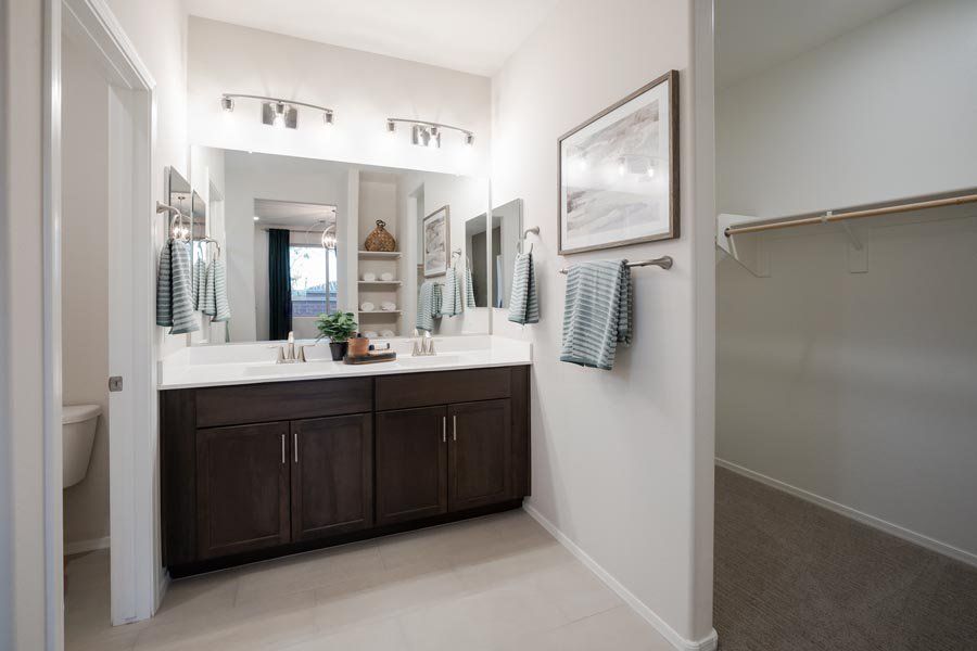 Furnished interior in a model home at Beacon Hill at Marley Park in Surprise (Image 34).