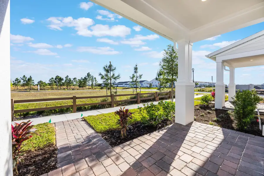Exterior details of a home in Harvest at Ovation - Townhomes, Winter Garden (Image 47).