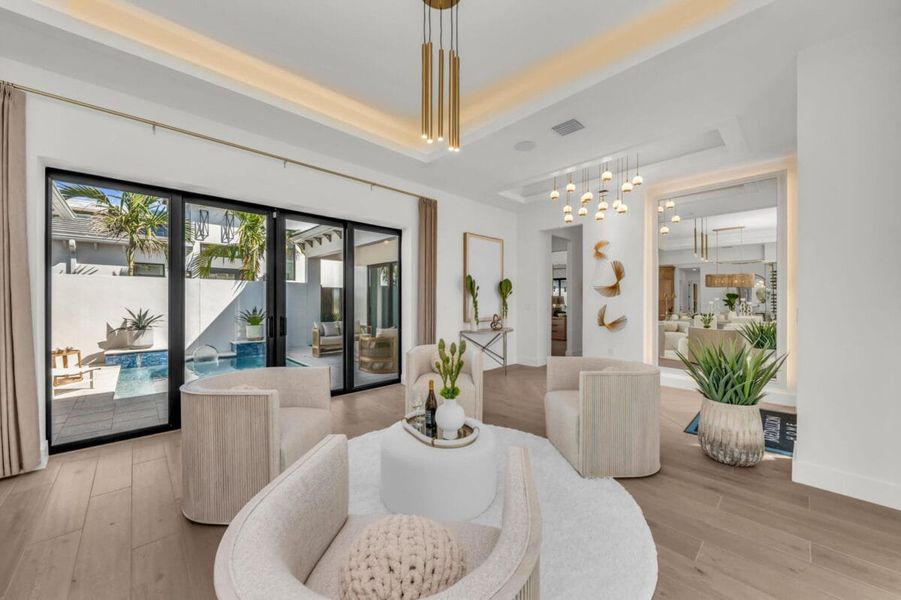 Furnished interior in a model home at Aqua in Bradenton (Image 153).