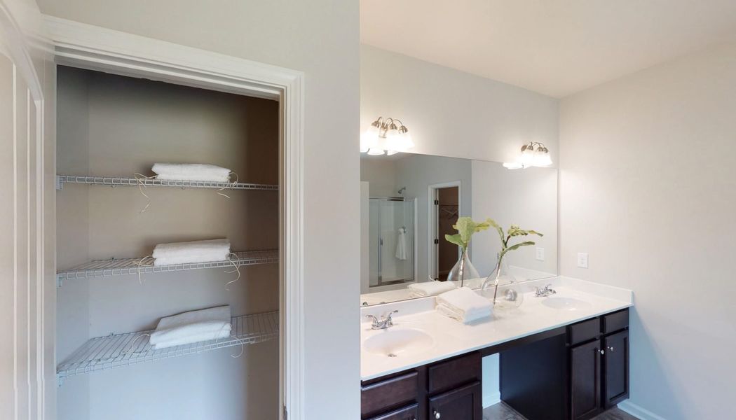 Furnished interior in a model home at North Village in Rydal (Image 19).