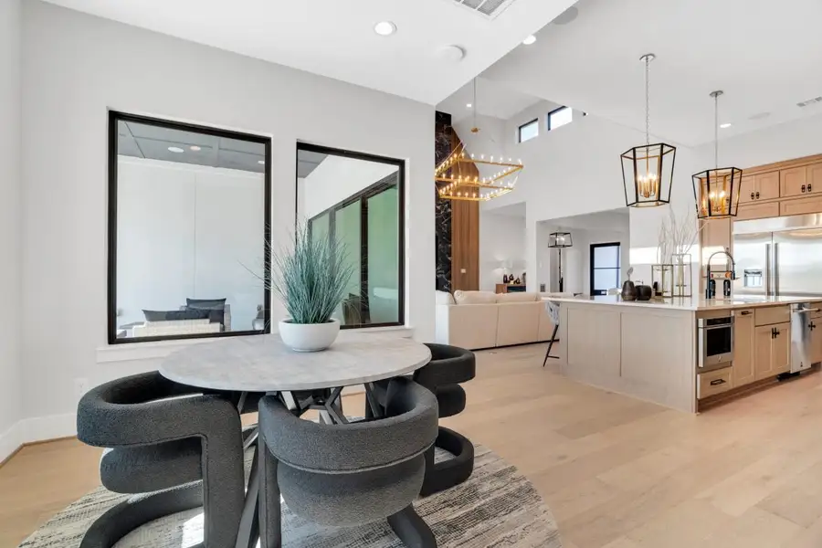 Furnished interior in a model home at Sienna in Missouri City (Image 4).