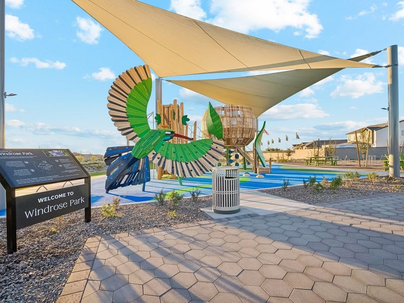 A large building with a large glass dome and a pool. A large building with a large glass dome and a pool.