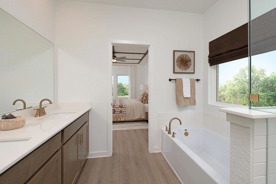 Furnished interior in a model home at Nopal Valley in San Antonio (Image 17).