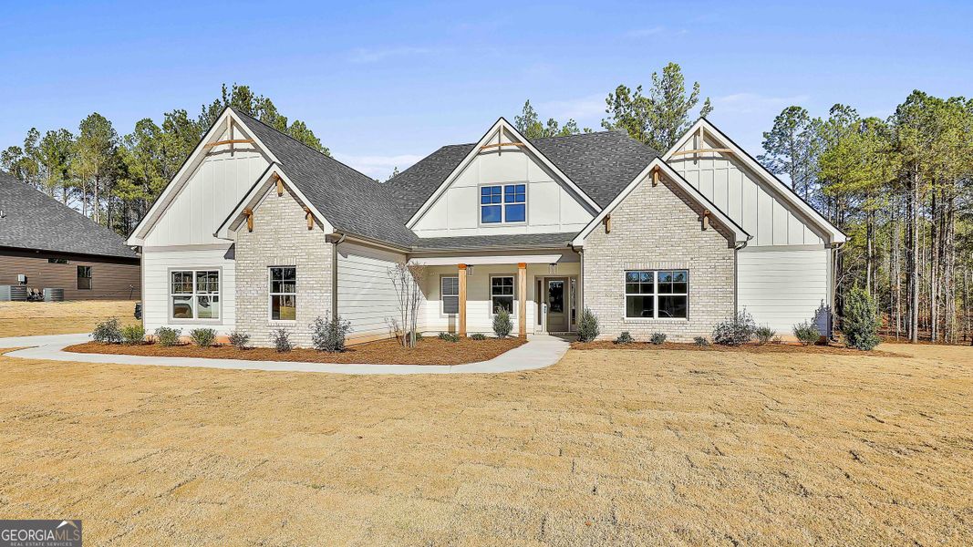 Front exterior of a home in the Fox Hall Phase V community, located in Senoia, GA (Image 3).