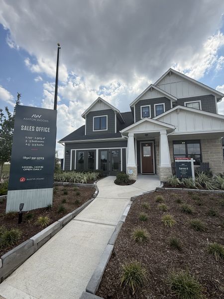 Beautiful modern home with landscaped path in Austin Point by Ashton Woods, featuring a charming exterior (Richmond, TX). Beautiful modern home with landscaped path in Austin Point by Ashton Woods, featuring a charming exterior (Richmond, TX).