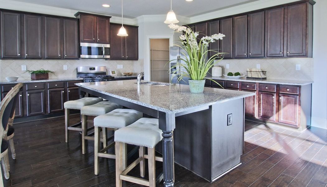 Furnished interior in a model home at Durham Lakes in Fairburn (Image 8).