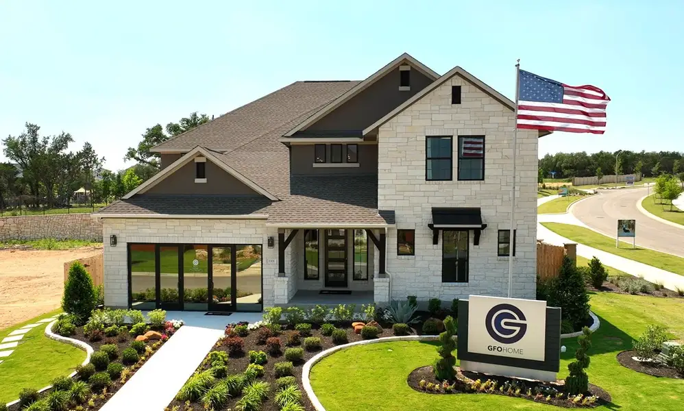 Front exterior of a home in the Heights at San Gabriel community, located in Georgetown, TX (Image 4).
