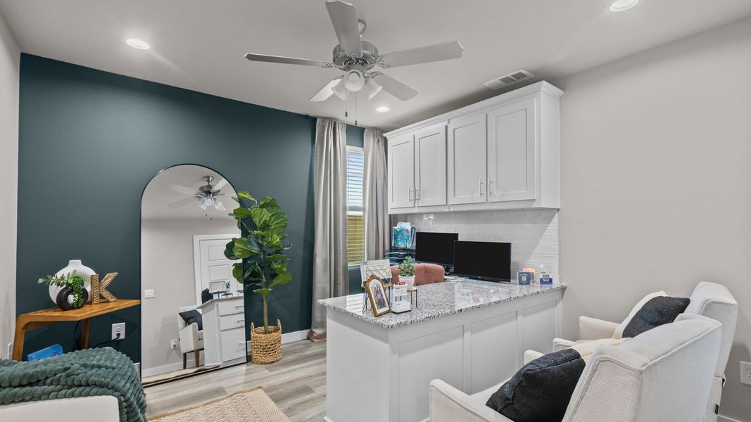 Furnished interior in a model home at Homestead at Parks Bell Ranch in Odessa (Image 30).