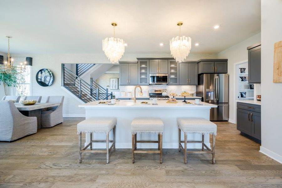 Furnished interior in a model home at Breakfast Point East in Panama City Beach (Image 9).