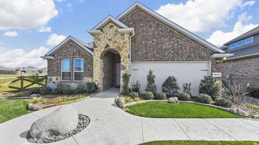 Front exterior of a home in the Silverado community, located in Aubrey, TX (Image 5). Front exterior of a home in the Silverado community, located in Aubrey, TX (Image 5).