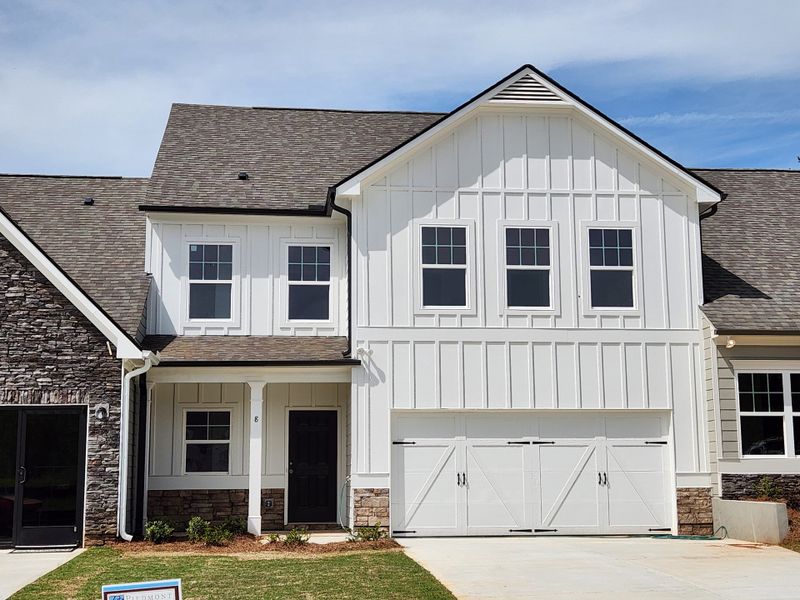 Front exterior of a home in the The Retreat at Browns Ridge community, located in Newnan, GA (Image 2).