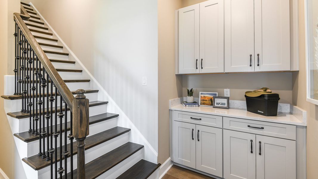 Furnished interior in a model home at Esplanade by the Islands in Naples (Image 36).