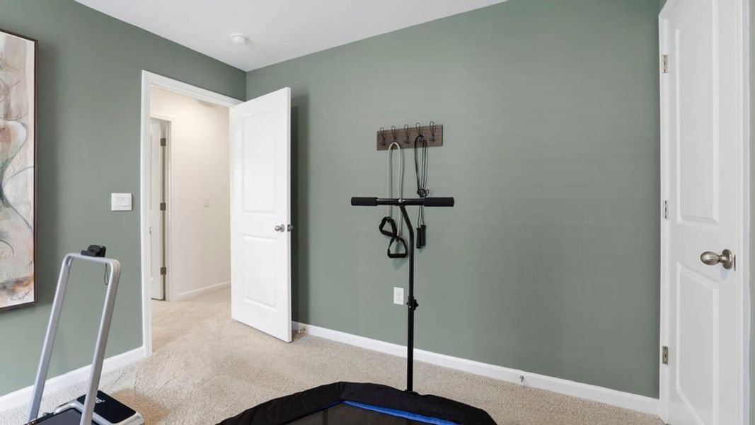 Furnished interior in a model home at Sherwood Gardens in Landrum (Image 32).